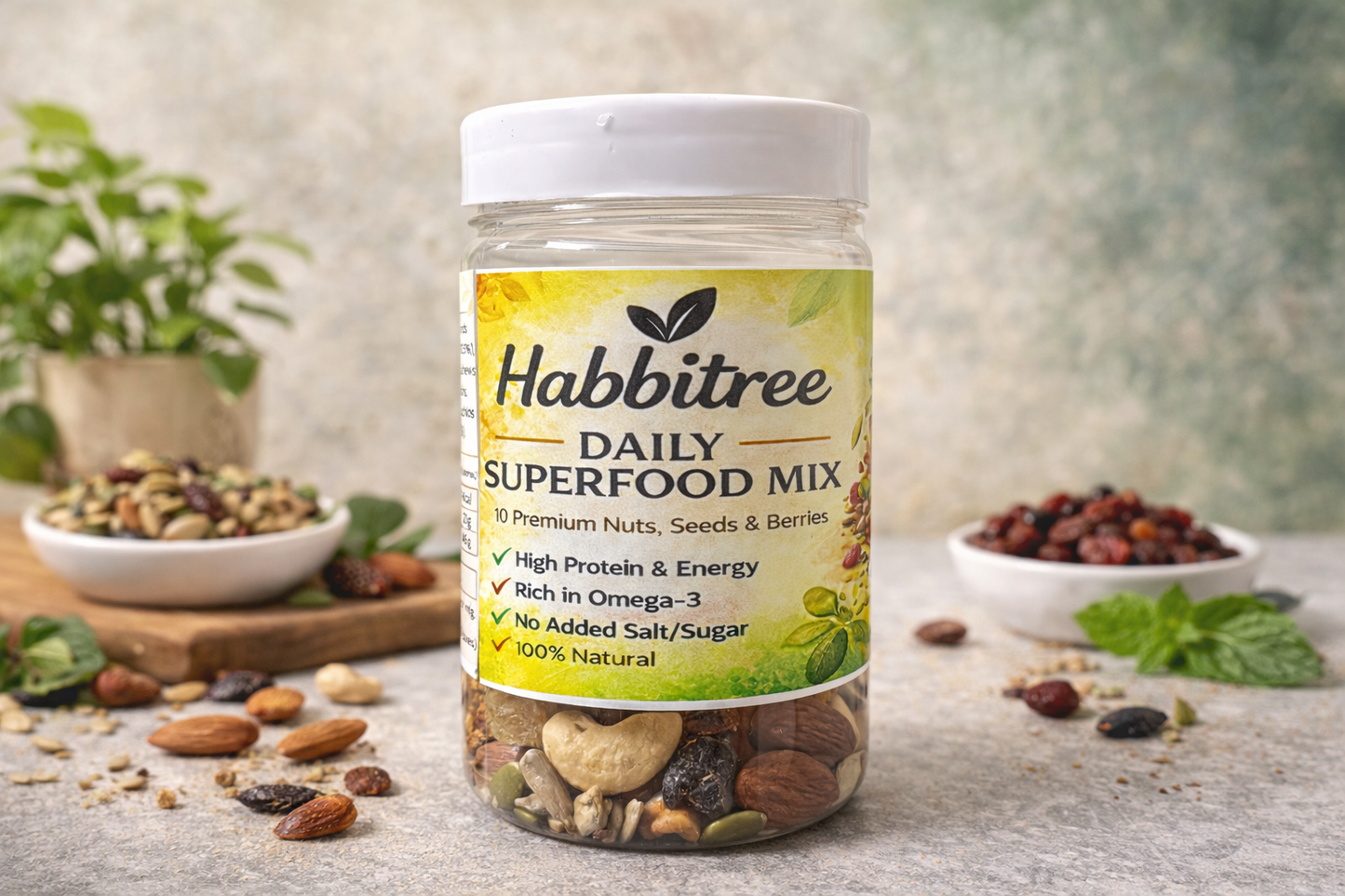 Wide-angle product photo of Habitree Daily Superfood Mix trail mix jar, highlighting mixed nuts and seeds inside the transparent jar, with colorful berries and leaf elements styled around it for a premium look.